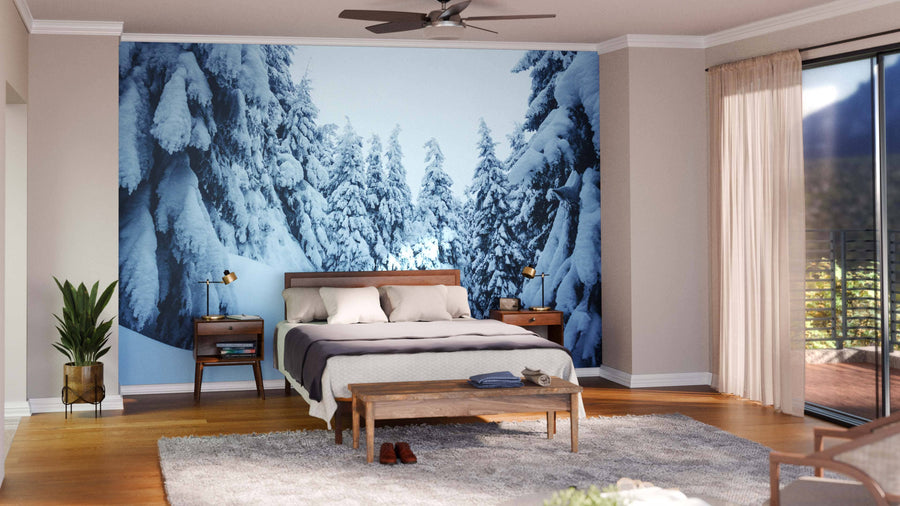 Modern living and dining room with wooden floors, mid-century furniture, and the Krivan Mountains in High Tatras Wall Mural. Cozy rugs, plants, and hanging lights add style, while the peel-and-stick removable mural brings scenic charm to the space.
