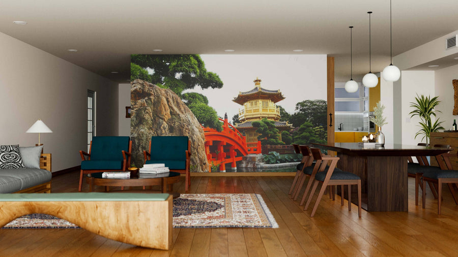 A modern living-dining room features wooden floors, contemporary furniture, and the Pavilion of Absolute Perfection Wall Mural depicting a traditional Asian pavilion and red bridge, creating a vibrant focal point in the serene space.