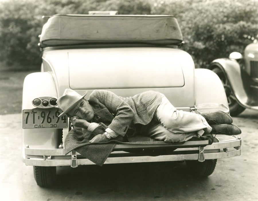 Man Lying on Bumper Wall Mural – Peel and Stick Wall Murals Peel and stick Wall Mural photo Color Original Custom Size