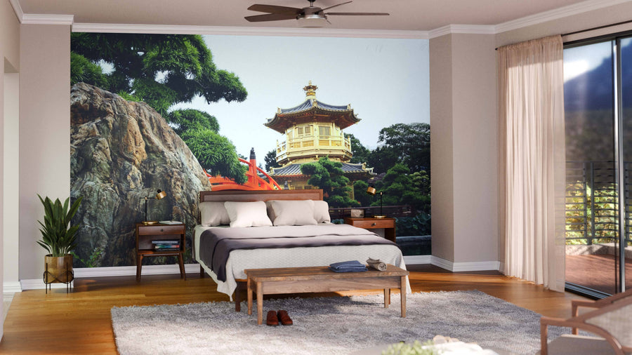 A modern living-dining room features wooden floors, contemporary furniture, and the Pavilion of Absolute Perfection Wall Mural depicting a traditional Asian pavilion and red bridge, creating a vibrant focal point in the serene space.
