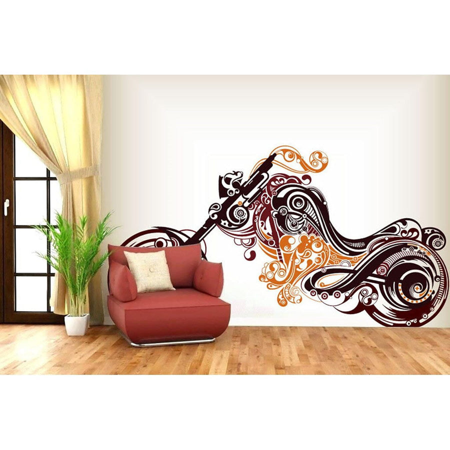 A modern living room showcases a brown lounge chair with a beige pillow against a white wall decorated with the ABSTRACT Open Road Wall Mural in brown and orange swirls. A tall green plant complements the scene, while light curtains partially cover the window on the left.