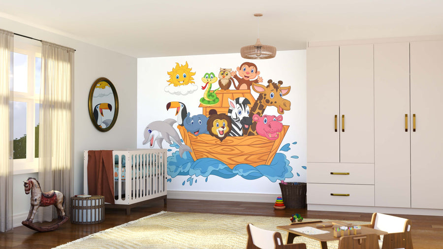 A nursery room with a crib, rocking horse, and toys. The Animals on the Ark Wall Mural features colorful cartoon animals—lion, zebra, elephant, giraffe, monkey, mouse, dolphin, tiger, pink hippo—on a wooden boat riding blue waves.