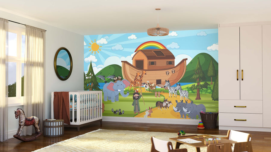 A nursery features the Ark Adventure Wall Mural with animals, a rainbow, and mountains. The room includes a crib, wicker basket, rug, toy rocking horse, light curtains, and sunlight streaming through the window.
