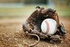 Baseball, Leather Glove and Ball on Pitch Sand Wall Mural