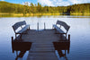 The Pier 3 Wall Mural showcases a serene wooden dock with benches by a calm, tree-lined lake. This removable wallpaper captures reflections on the water, making it perfect for adding nature-inspired tranquility to any space.