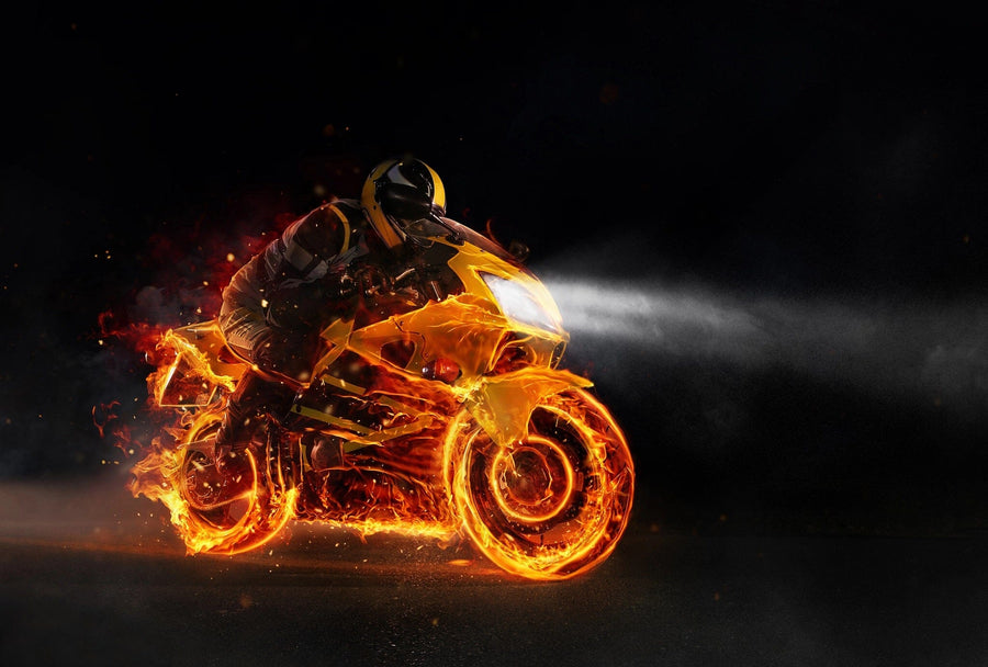 A tidy garage with dark cabinets and tools on the left, a motorcycle parked on the right, and a Blazing Bike Wall Mural on the back wall featuring a glowing motorcycle and rider made of fiery orange light streaks on a black background.