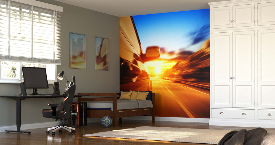 A modern bedroom with a computer desk, office chair, and single bed. Next to the bed is a High-Speed Car at Night Wall Mural, highlighted by two framed art prints and a sleek white wardrobe.