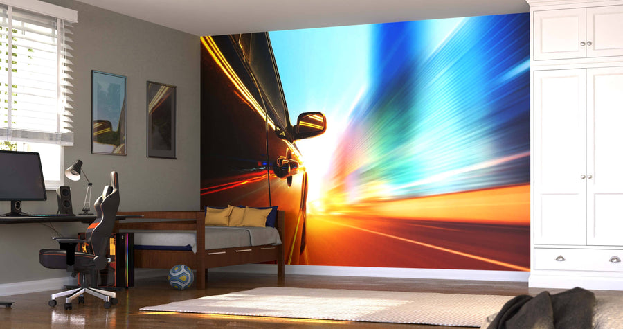 A modern bedroom with a desk, bed, and wardrobe. The main wall showcases the High-Speed Car at Night Wall Mural, featuring vibrant light trails and motion blur for a dynamic effect. Sunlight streams through a window with white blinds.