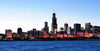 Adorn your space with the Chicago Dark Night Time Panorama Wall Mural, showcasing a breathtaking dusk view of the skyline featuring Willis Tower's pink-lit antennas. The illuminated cityscape contrasts against a twilight sky with Lake Michigan in the foreground—a perfect peel and stick mural.