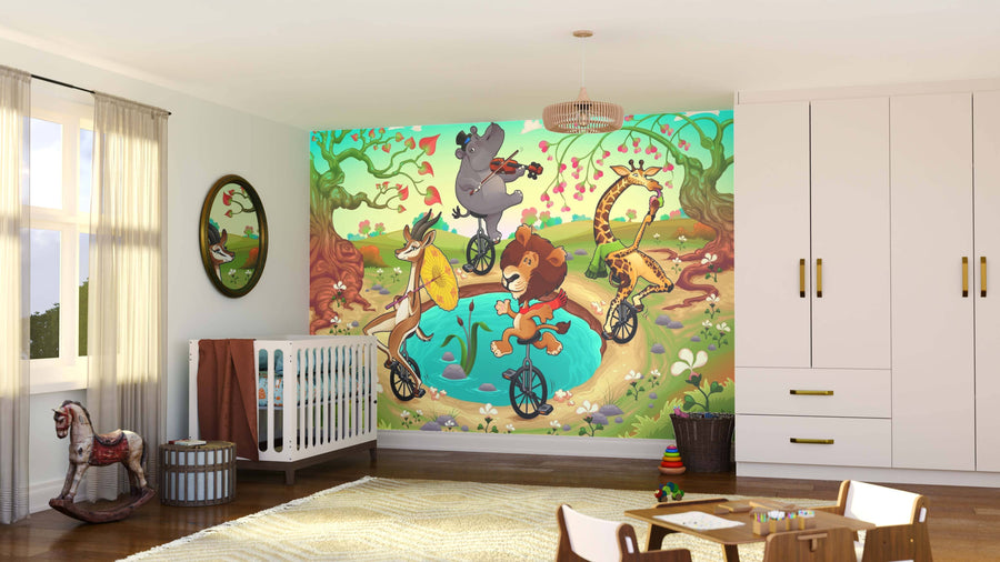 A nursery with a white crib, toys, and the Circus in the Wild Wall Mural—featuring jungle animals riding unicycles by a pond under trees—creates a playful, imaginative space with whimsical custom-printed details.