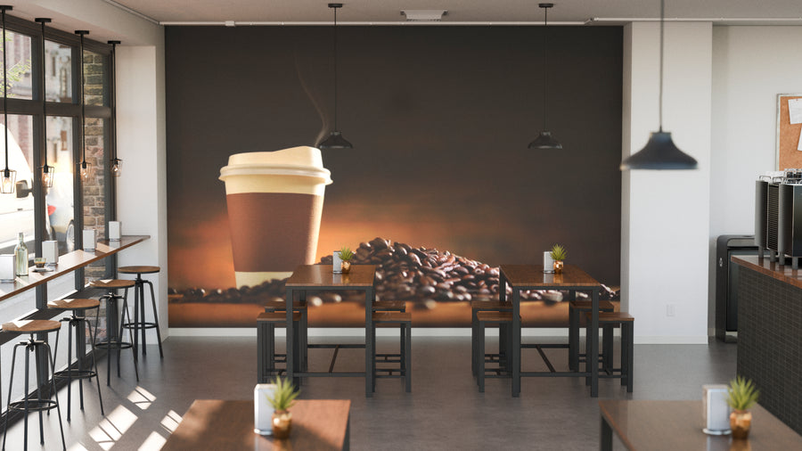 A modern coffee shop features wooden tables and stools, potted plants, pendant lights, and a custom "Coffee Cup with Roasted Beans Wall Mural," with sunlight streaming through large windows for a bright, inviting atmosphere.