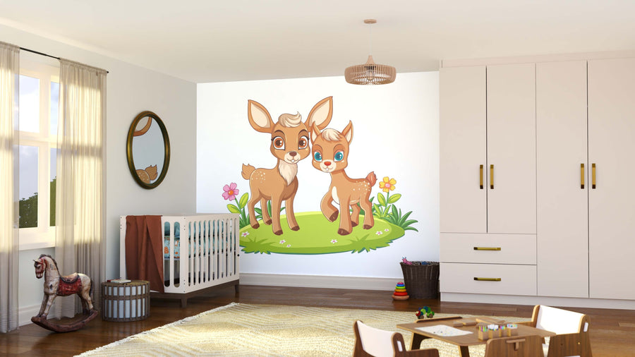 A bright nursery features a crib, rocking horse, and the Deer Friends Wall Mural showing two cartoon deer on grass with flowers. A wooden floor, woven rug, toys, and white wardrobe create a cozy, playful atmosphere.