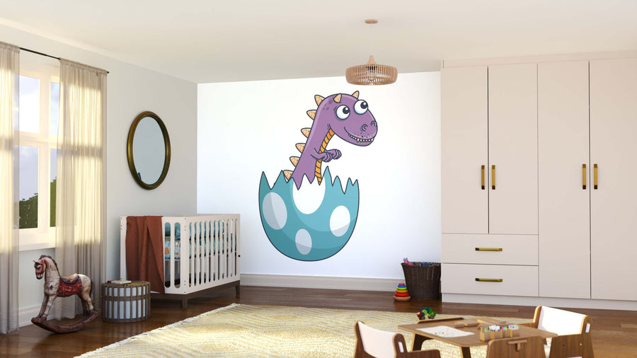 A bright, modern nursery features the Dino Hatchling Wall Mural—a large peel and stick mural of a smiling purple cartoon dinosaur emerging from a blue egg—plus a crib, toy horse, round mirror, wicker basket, closet, and window with sheer curtains.