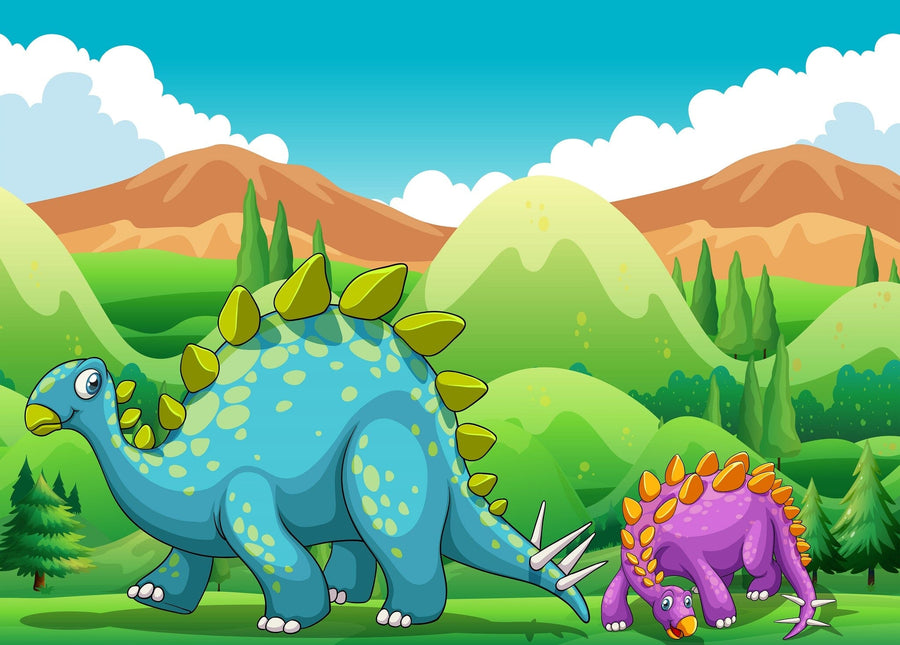 A baby nursery with a crib, dresser, and plant features the Dino Stroll Wall Mural of cartoon dinosaurs and green hills behind the crib. Framed photos and baby supplies are on the dresser; a plush turtle toy sits on the floor.