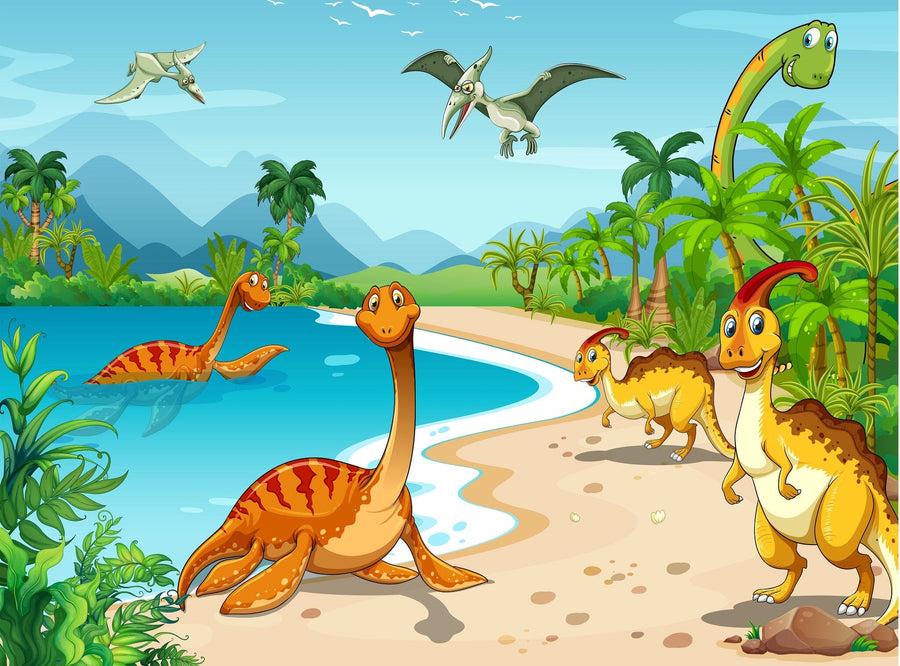A nursery displays a crib by the wall with the Dinos at the Beach Wall Mural, featuring dinosaurs by water, mountains, and palm trees. The space includes a white dresser, plant, floating toy shelves, framed photos, and wood flooring.