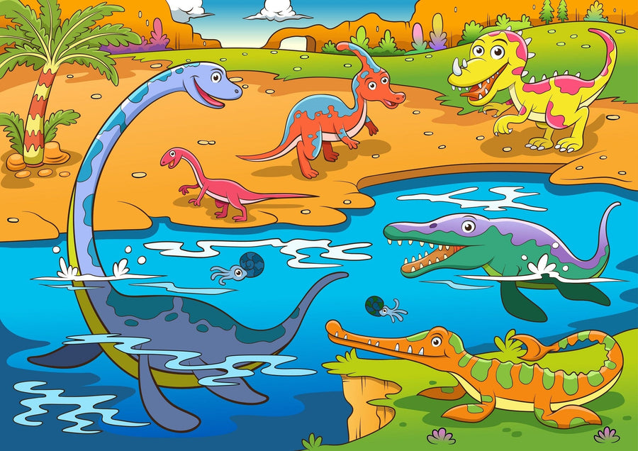 A nursery features the Dinosaur Lagoon Wall Mural, showcasing cartoon dinosaurs and prehistoric creatures by water and palm trees. The room includes a white crib, modern dresser, toy shelves, framed photos, a leafy plant, and wooden floors.