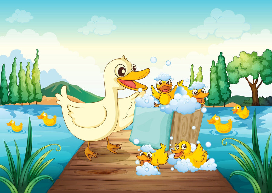 A bright nursery features the Duck Family Wash Wall Mural, showing a large cartoon duck and ducklings splashing in water. The room includes a crib, rocking horse, toys, an oval mirror, and big windows with blue curtains for playful charm.
