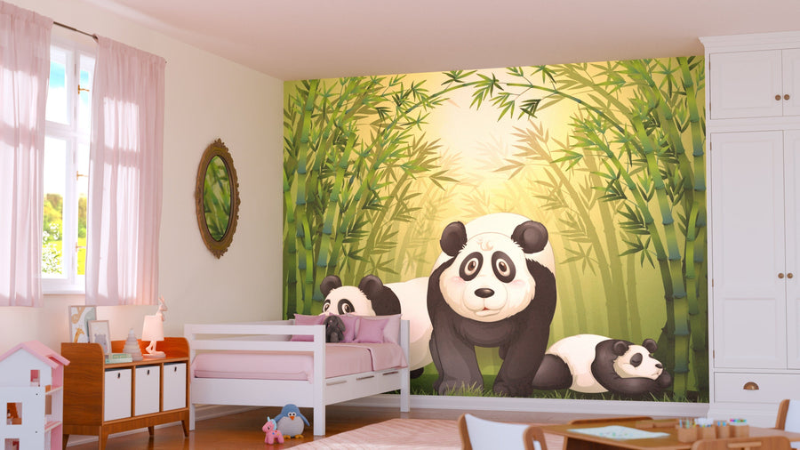 A cozy kids' room features the Big Bears Wall Mural with three pandas among bamboo, a white bed with pink blanket, plush toys, toy house, wardrobe, small desk, and soft pink curtains letting in sunlight.