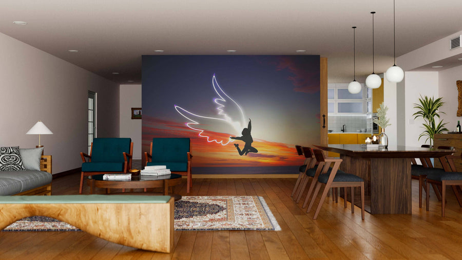 Modern open-concept living and dining area with wooden floors, teal chairs, and the Jumping Girl Wall Mural featuring a neon-outlined winged figure at sunset. Contemporary furniture and pendant lights create a cozy, stylish vibe.