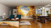 A modern living-dining area with wood floors, mid-century furniture, pendant lights, and the Autumn Boulevard Wall Mural, a large peel and stick design of a sunlit park that adds depth and brings nature indoors.