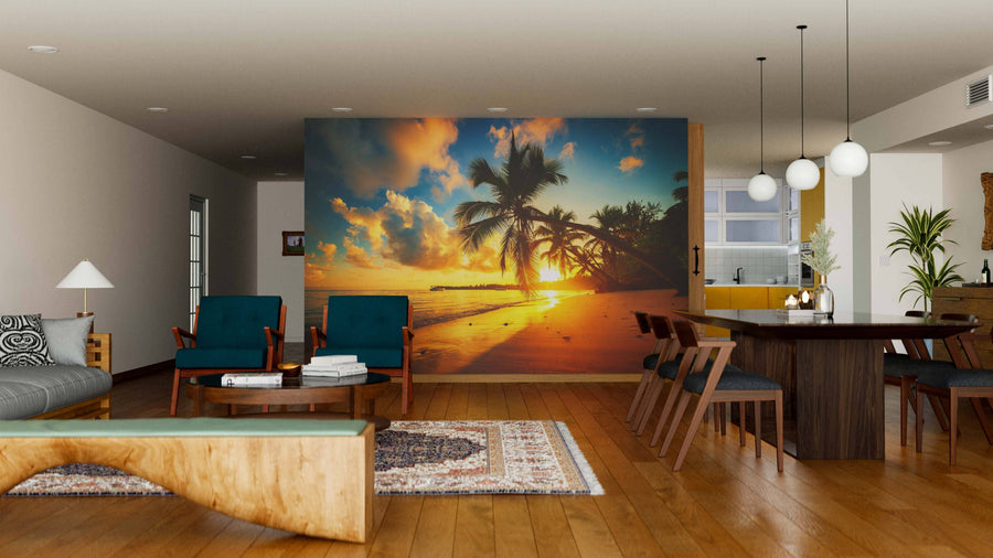 Modern living-dining room with wooden floors and mid-century furniture features the Beach in Punta Cana Wall Mural, a custom peel and stick print depicting a tropical sunset, adding golden light and vibrant ambiance to the open-plan space.
