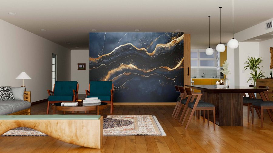 A modern living room features the Celestial Rift Wall Mural, showcasing a black and gold marble pattern. The space includes two white sofas, a white oval coffee table adorned with plants and decor, a brown leather chair, and is warmed by a textured beige carpet on the floor.