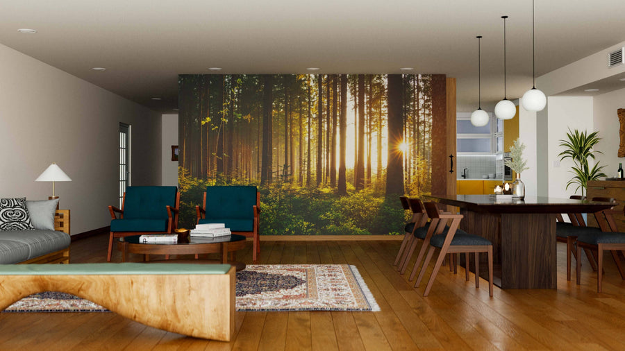 A modern living-dining room with wood floors and mid-century furniture features the Forest in Spring Morning Wall Mural for a serene vibe, enhanced by pendant lights and cozy decor to create an inviting space.