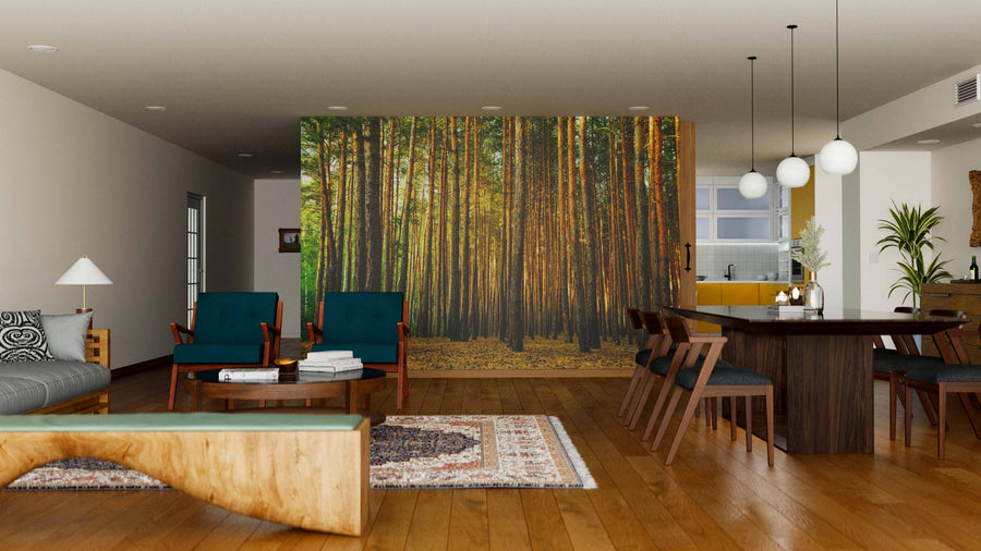 A modern open-plan living and dining area with wooden floors, mid-century furniture, and a large dining table is enhanced by the Tall Thin Forest Trees Wall Mural, bringing a serene, natural atmosphere to the stylish space.