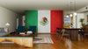 A room with a flag painted on the wall, featuring a Mexico Wall Mural that adds vibrant personality and style.