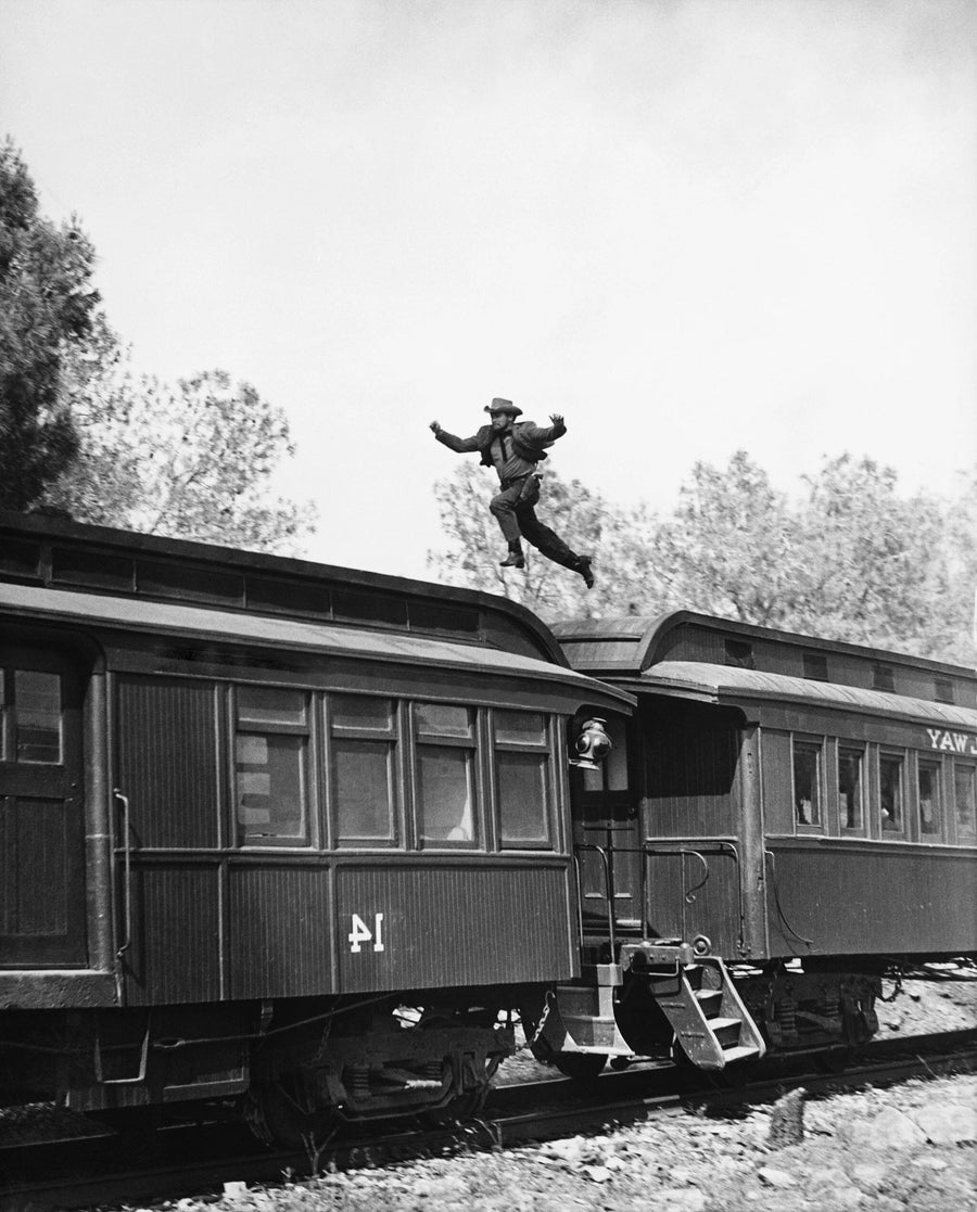 Leaping Across the Train Wall Mural Peel and stick Wall Mural photo Color Original Custom Size