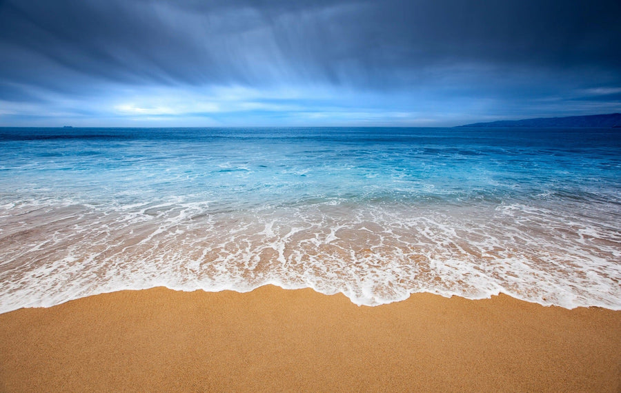 serene beach with crashing waves and a clear blue sky above – Peel and Stick Wall Murals