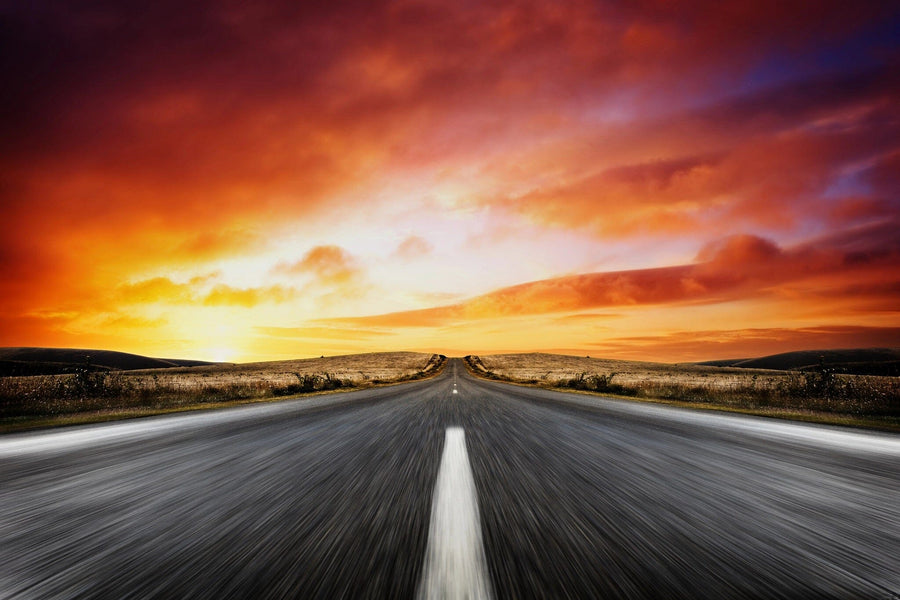 An empty road at Sunset Strip with a beautiful sunset in the background – Peel and Stick Wall Murals