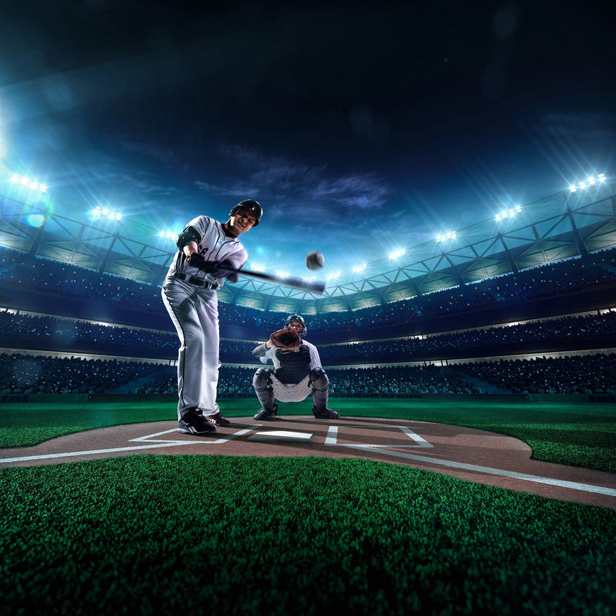 The energetic scene of a baseball player swinging under stadium lights at night makes the Swing to Win Wall Mural a perfect matte canvas-textured, removable mural to add excitement and energy to any space.