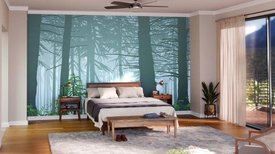 A modern bedroom features the Misty Forest Landscape Wall Mural behind the bed, wooden furniture, a gray rug, plants, and sheer curtains on a large window. Sunlight and minimal earthy decor create a calm, inviting atmosphere.