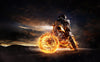 A motorcyclist in a leather jacket and helmet rides on fiery wheels along a dark road, under a dramatic sunset sky. This intense scene mirrors the thrill captured by photo's Motor 10 Wall Mural.