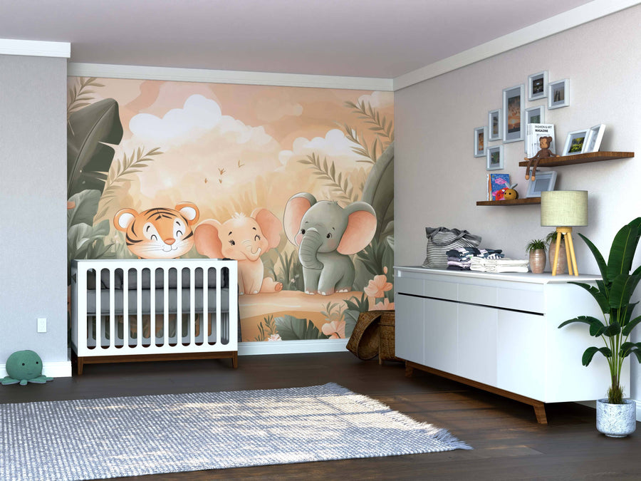 A nursery with a white crib, wood floors, and soft neutrals features the Gentle Giants Wall Mural—a peel-and-stick mural with cartoon tiger, elephant, and giraffe in a jungle. Wall shelves above the dresser hold books and decor.