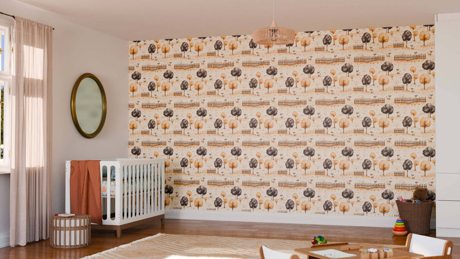 A cozy nursery features the Golden Meadows Wall Mural with trees and animals in orange and brown, a white crib, round mirror, wooden toys, baskets, sheer curtains on large windows, and warm sunlight filling the inviting space.