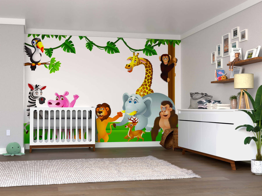 A bright nursery with a large Jungle Animal Friends Wall Mural featuring cartoon jungle animals by a white crib. The room includes a white rug, modern dresser, plant, shelves, and wooden floor.