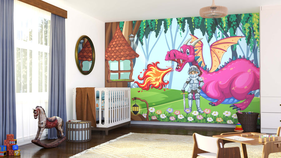 A nursery with a crib, rocking horse, toys, and blue curtains features the Knight on Dragon Guard Wall Mural, which displays a pink dragon breathing fire, an armored knight, trees, flowers, and a whimsical house in a playful fantasy scene.