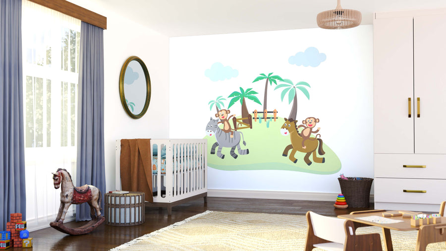 A bright nursery features a crib, toy horse, and the Monkey Riders Wall Mural with two monkeys on horses near palm trees. Blue curtains, a round mirror, a soft rug, toys, and baskets complete the playful, cheerful vibe.