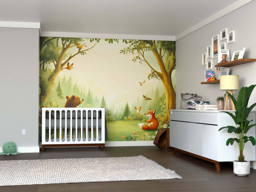 A nursery features a white crib and dresser. The highlight is the Secret Meadow Wall Mural depicting a bear and fox in a forest with trees, birds, and butterflies. Shelves display toys, framed photos, and a plant; wood floors have a beige rug.