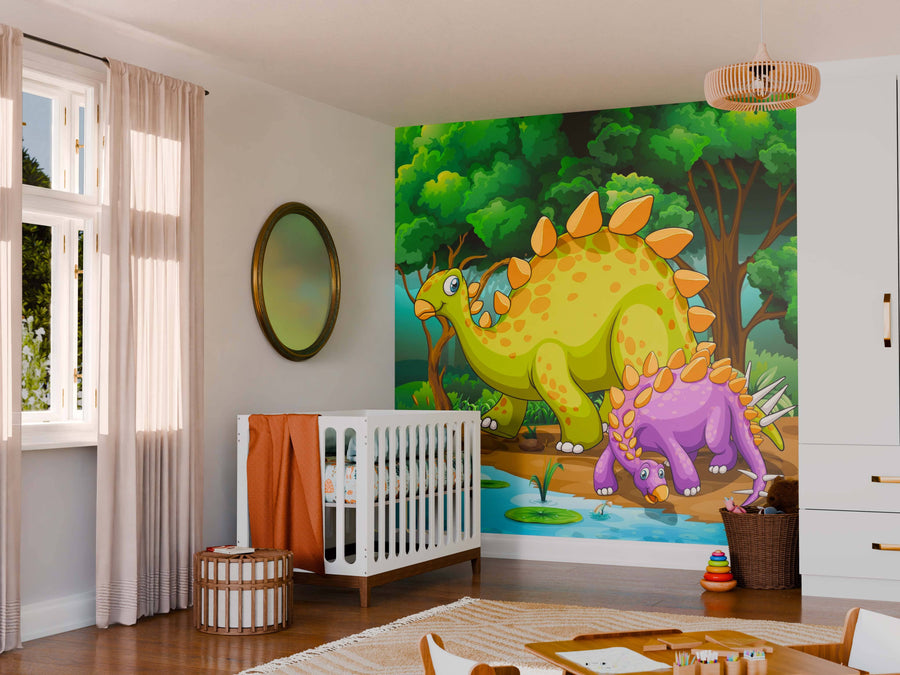 A nursery features a white crib, wicker accents, and the vibrant "Sip by the Stream Wall Mural" depicting colorful cartoon dinosaurs in a lush forest. Soft light filters through sheer curtains from a window on the left.