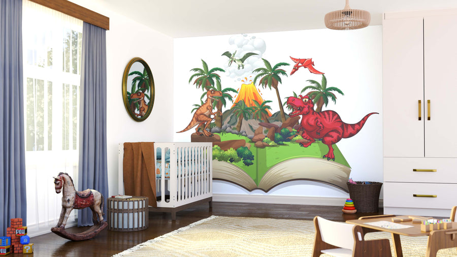 A nursery featuring the Volcano Dino World Wall Mural with cartoon dinosaurs, palm trees, and a volcano from an open book, plus a crib, rocking horse, toys, blue-curtained window, and white furniture with wooden accents.