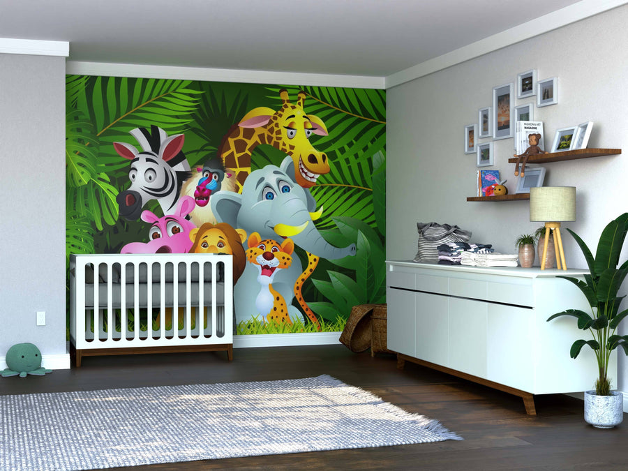 A nursery with a white crib beside the Wild Animals Wall Mural, which features cartoon jungle animals and green leaves. To the right are a dresser, a plant, and wall shelves displaying framed photos and books.