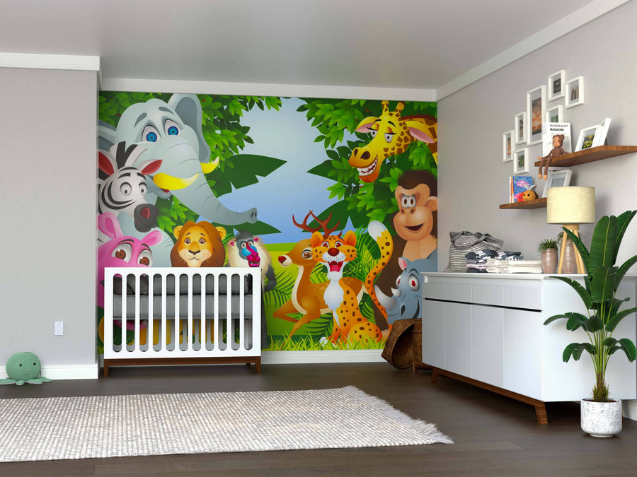 A bright nursery features the Wild Animals in the Forest Wall Mural with cartoon jungle animals. A white crib stands against it, surrounded by a dresser, shelves, plants, and a cozy rug.