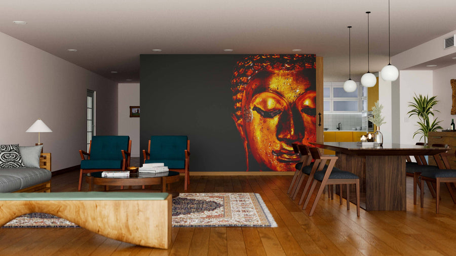 A modern living and dining room features wooden floors, teal chairs, a round coffee table, a large wooden dining table, and an Old Golden Buddha Statue Wall Mural. Pendant lights and minimalist decor add warmth to the inviting space.