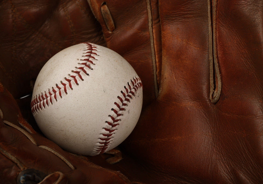 Old baseball in worn glove – Peel and Stick Wall Murals