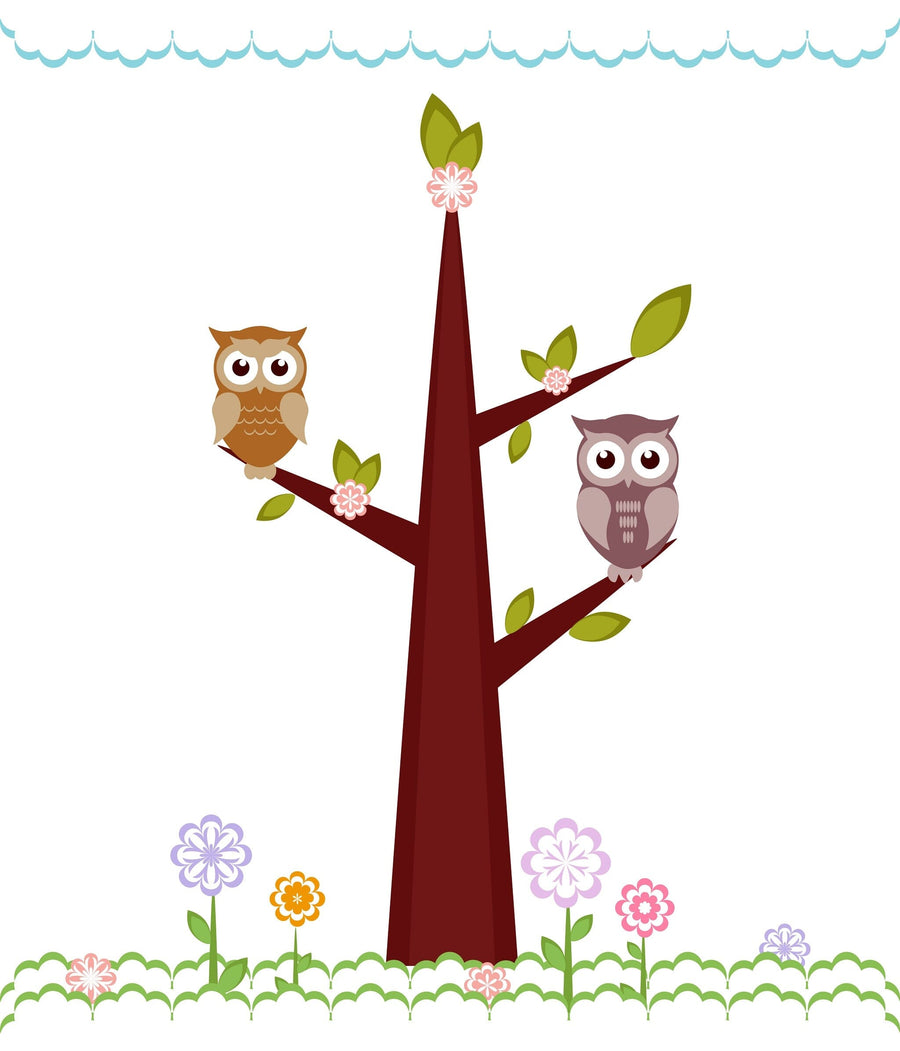 A modern nursery features a crib, dresser, and the Owls on Branches Wall Mural. Family photos, a potted plant, rug, and turtle plush toy add charm to the softly lit wooden floor.