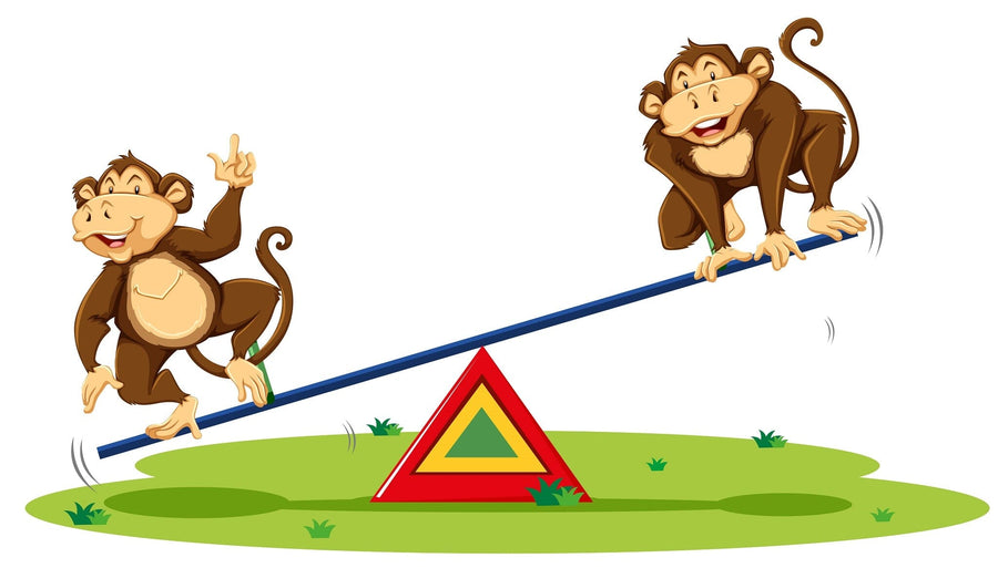 A nursery room with a white crib and dresser features the Playful Monkey See-Saw Wall Mural, showing two cartoon monkeys on a seesaw over green grass. A rug, toys, and shelves with books and decor complete the cheerful space.