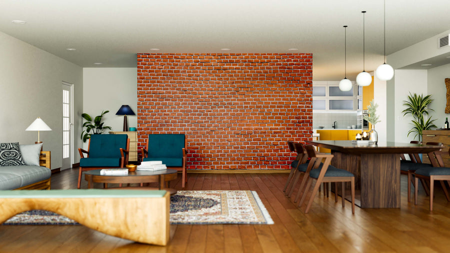 Modern open living and dining room with wood floors, teal chairs, sofa, wooden dining set, globe lights, yellow kitchen cabinets, plants and lamps for warmth, plus a custom Red Brick Pattern Wall Mural accent wall.